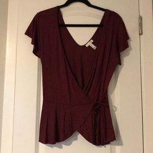 Flirty maroon wrap top